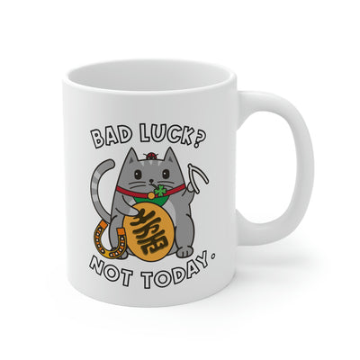 A coffee mug with a Maneki Neko Milton the Cat with the text: Bad Luck? Not today.