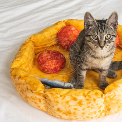 Pizza Cat Bed includes 3 pepperoni pillows and 3 anchovy pillows